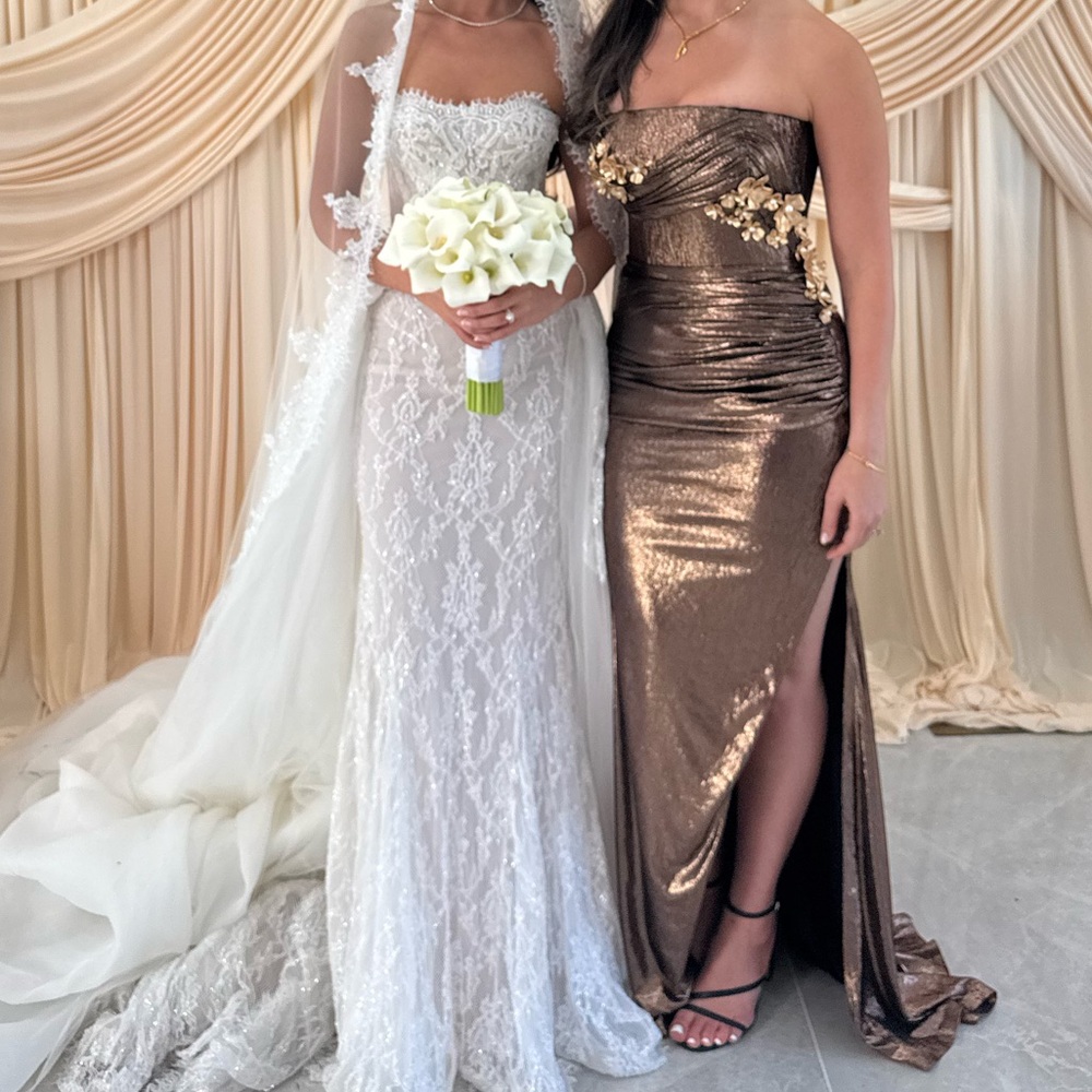 Elegant black/gold wedding guest dress that is has 3D floral. Prom perfect